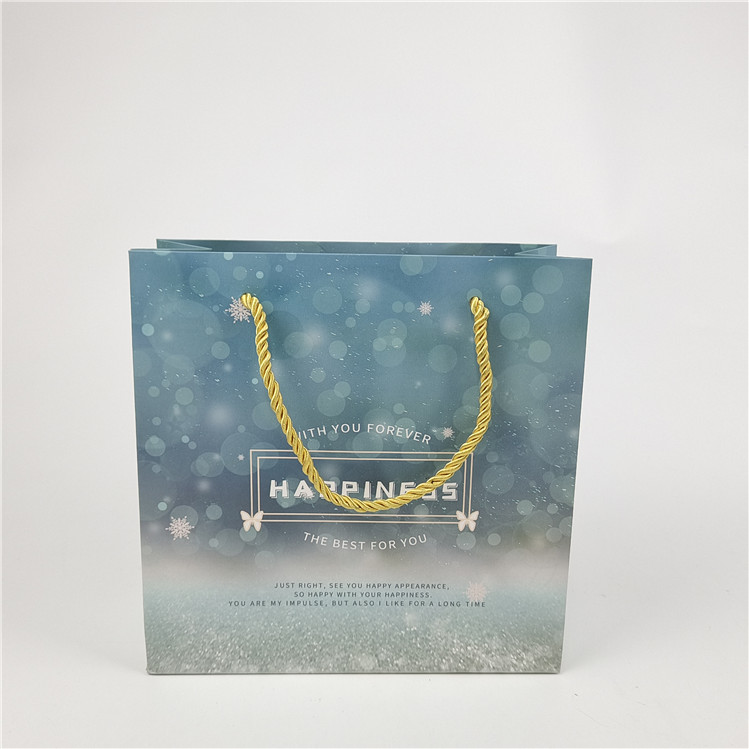 Được bán nhiều nhất Nhãn hiệu tái chế thân thiện với môi trường Thẻ in túi giấy mua sắm Bao bì trắng 110 gram tái sử dụng