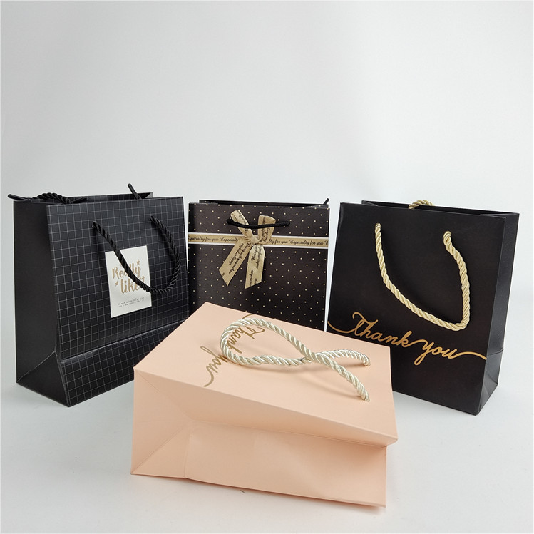 Chất lượng cao tùy chỉnh in kỹ thuật số Logo in túi giấy mua sắm đóng gói trắng 110 gram tái sử dụng